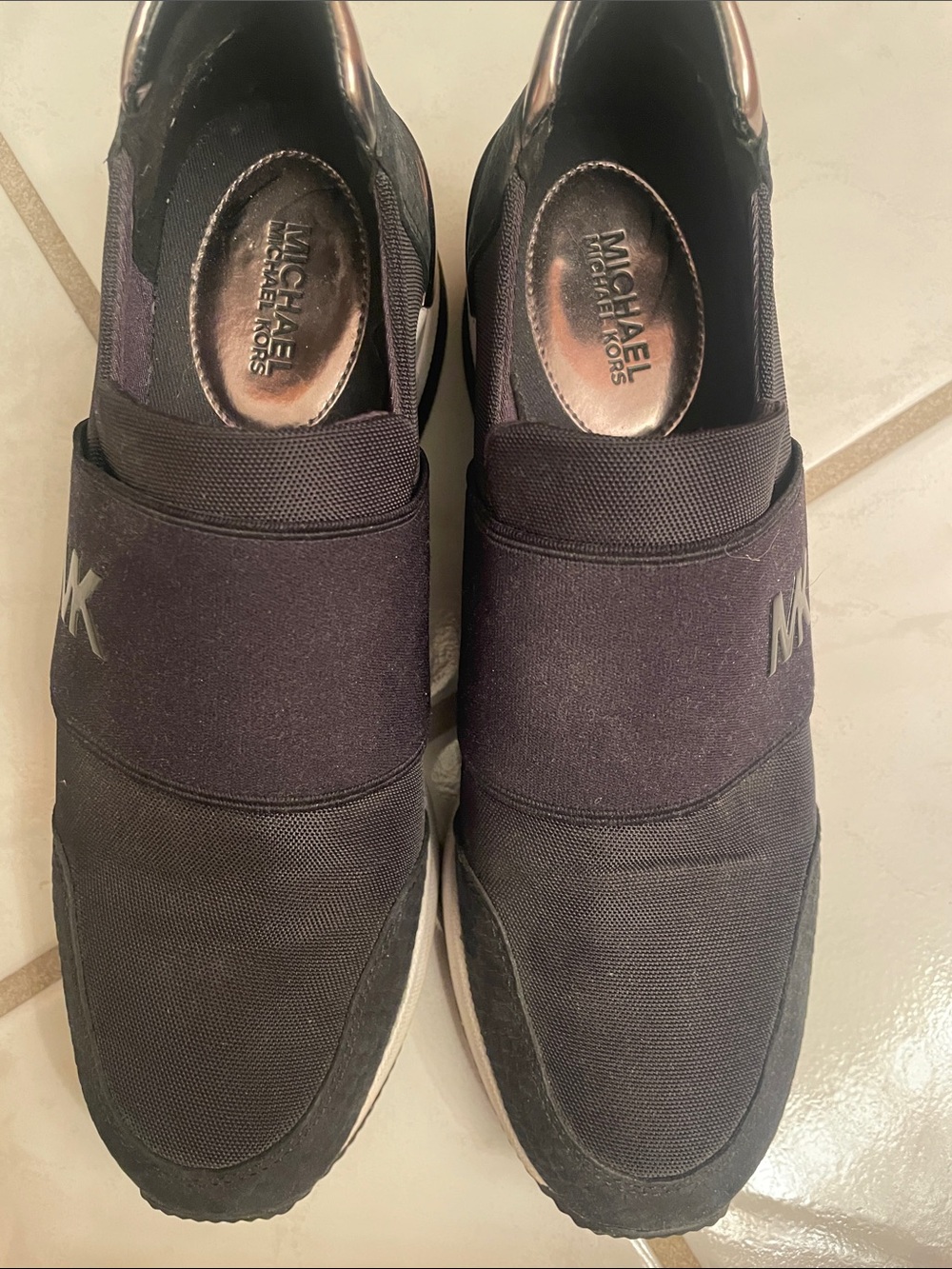 Michael Kors womans Black Slip-On Knit Sneakers with MK Logo